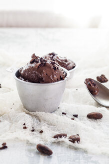 Cups of homemade chocolate icecream sprinkled with cacao nibs - SBDF002066