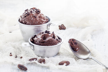 Cups of homemade chocolate icecream sprinkled with cacao nibs - SBDF002067