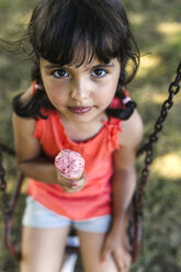 Portrait of little girl with ice cream cone - MGOF000308