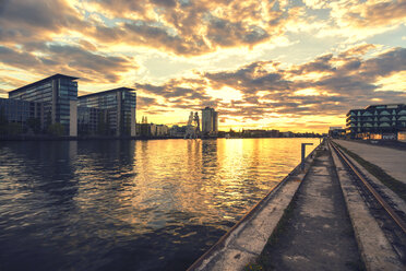 Germany, Berlin, view from Osthafen above River Spree at sunset - TAMF000044