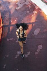 Spain, Barcelona, jogging young woman - EBSF000721