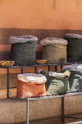 Morocco, Marrakesh, bags on a shelf - JUNF000337