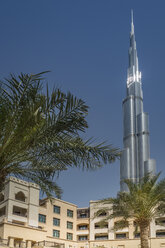 United Arab Emirates, Dubai, residential area at Souk al Bahar with Burj Khalifa in the background - NKF000274