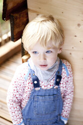 Portrait of little boy wearing dungarees - MFRF000240