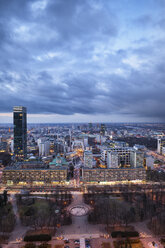 Poland, Warsaw, view to the city centre at evening twilight - ABOF000029