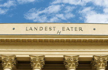 Austria, Innsbruck, falling letter on the facade of state theatre - VI000330