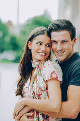Portrait of happy young couple outdoors - CHAF000445