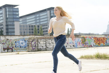 Germany, Berlin, running woman - BFRF001346