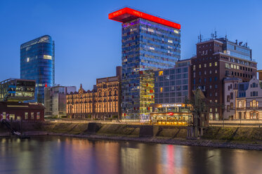 Germany, Duesseldorf, Media harbour, High-rise building Colorium, blue hour - FR000286