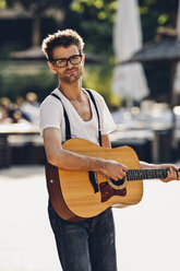 Portrait of young man with guitar - CHAF000811