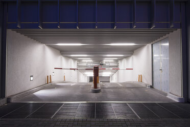 Germany, Berlin, entrance to underground car park at night - CM000295