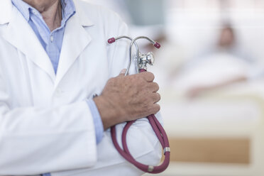 Close-up of doctor in hospital holding stethoscope - ZEF006079