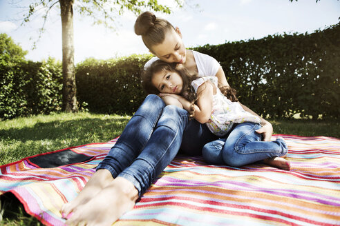 Mother consoling and her little daughter - GDF000829