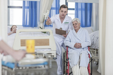 Nurse with elderly female patient in wheelchair - ZEF007008