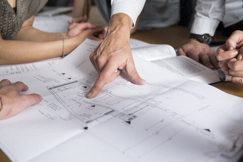 Hand pointing on construction plan - FKF001285