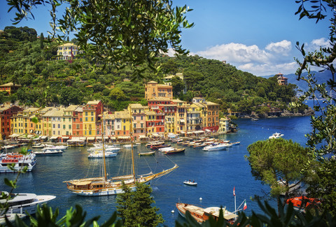 Italy, Liguria, Portofino, boats and row of houses stock photo