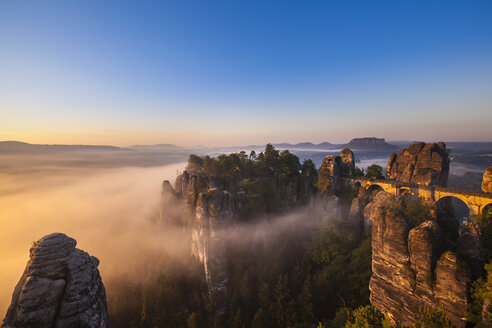 Germany, Saxony, Saxon Switzerland National Park, Elbe Sandstone Mountains and Bastei bridge at dawn - HSIF000371