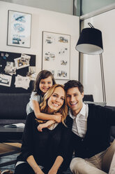 Happy family with daughter in living room - CHAF000997