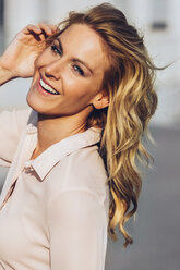 Portrait of smiling blond woman - CHAF001037