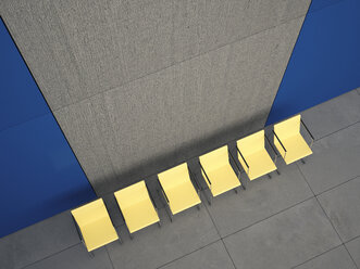 View to row of six yellow chairs in a lobby from above, 3D Rendering - UWF000578