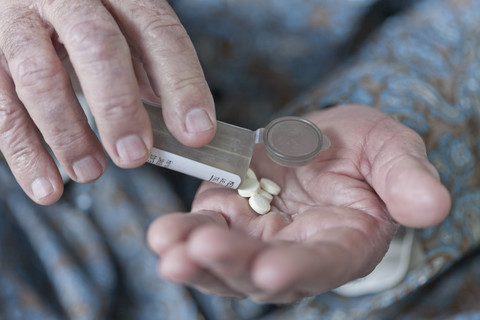 Patient taking medication stock photo