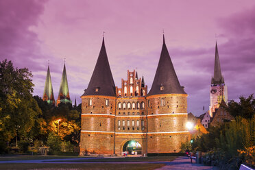 Germany, Luebeck, view to Holsten Gate at twilight - PUF000414