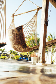 Indonesia, Bali, hammocks on terrace of a holiday villa - MBEF001407