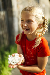 Portrait of smiling little girl with braids - MGOF000392