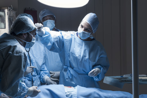 Surgical team during an operation stock photo