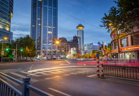 China, Shanghai, intersection at peoples square at twilight - NKF000345