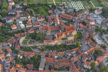 Germany, aerial view of Quedlinburg with collegiate church in the evening - PVCF000589