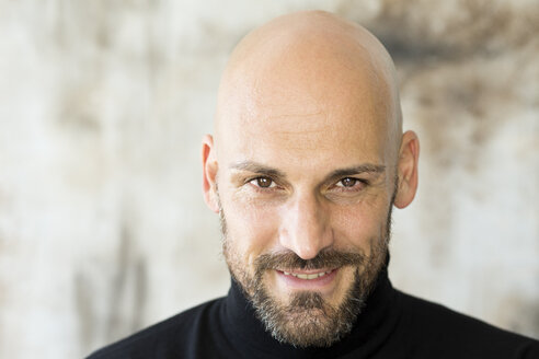 Portrait of staring man wearing black turtleneck - MAEF010895