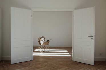 Pram in empty room, open doors - CHAF001056