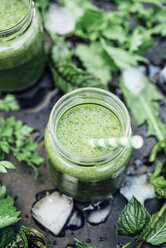 Two glasses of wild herb smoothie with apple, banana and lime juice - IPF000238