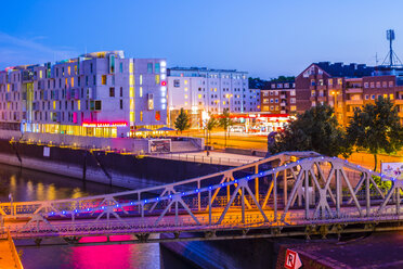 Germany, Cologne, Rheinau harbour, Swing bridge and Design Hotel Art'otel, blue hour - WGF000703