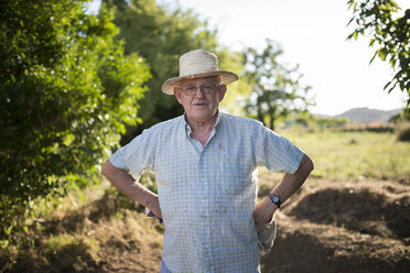 Portrait of farmer with hands on his hips - RAEF000312