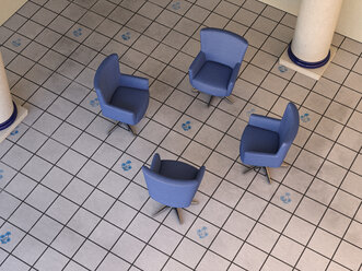 Four blue armchairs standing in circle on tiled floor - UWF000593