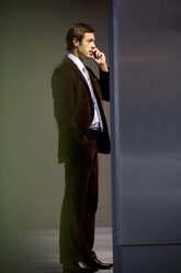 Confident businessman on the phone - TOYF001247