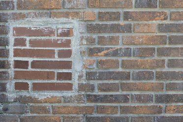 Repaired old brick wall - ERLF000018