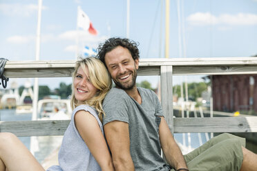 Germany, Luebeck, smiling couple outdoors - FMKF001846