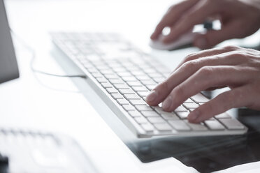 Close-up of man working on computer - ZEF007115