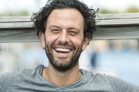 Portrait of happy man outdoors stock photo