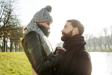 Happy couple at the riverside in autumn - PESF000133