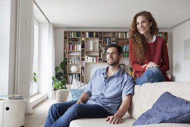 Relaxed couple at home on couch - RBF003526