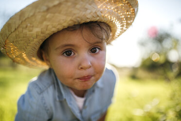 Portrait of little girl wearing straw hat - MGOF000517