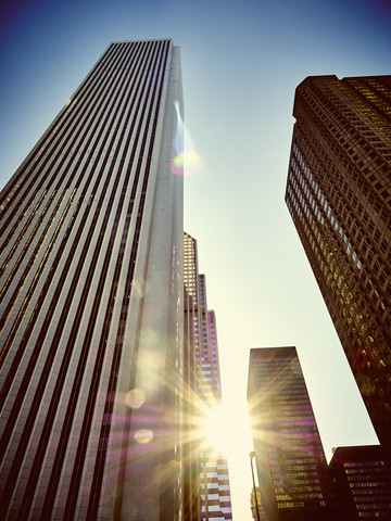 USA, Illinois, Chicago, High-rise buildings, Aon Center against sunlight stock photo