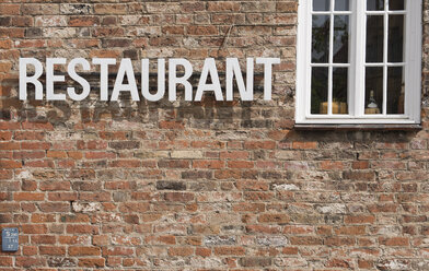 Facade of brick house with the word restaurant - VIF000372