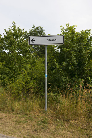 Wegweiser zum Strand, lizenzfreies Stockfoto