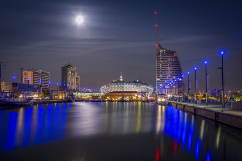 Germany, Bremerhaven, Klimahaus and Atlantic Hotel Sail City at night - NKF000380