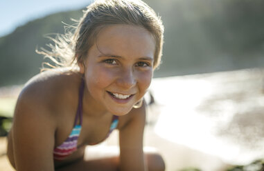 Portrait of tan girl on the beach - MGOF000598